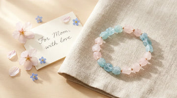 Handcrafted natural stone bracelet with rose quartz and aquamarine as a meaningful Mother's Day gift.