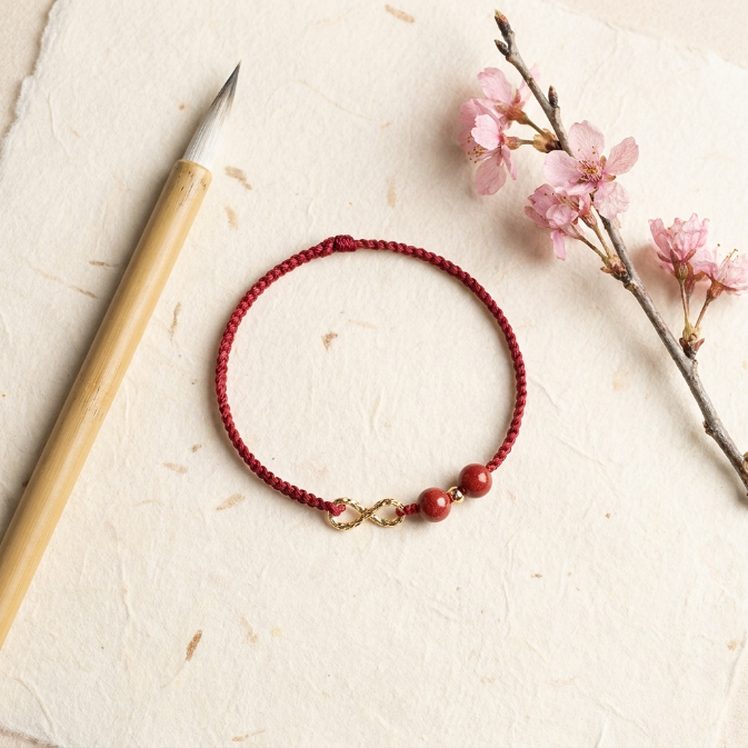 Cinnabar Gold Infinity Red String Bracelet