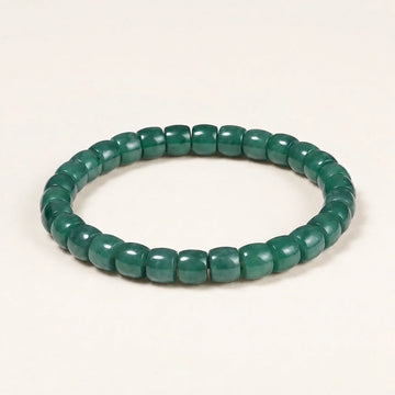 Bracelet en perles tonneau de jade bleu du Guatemala