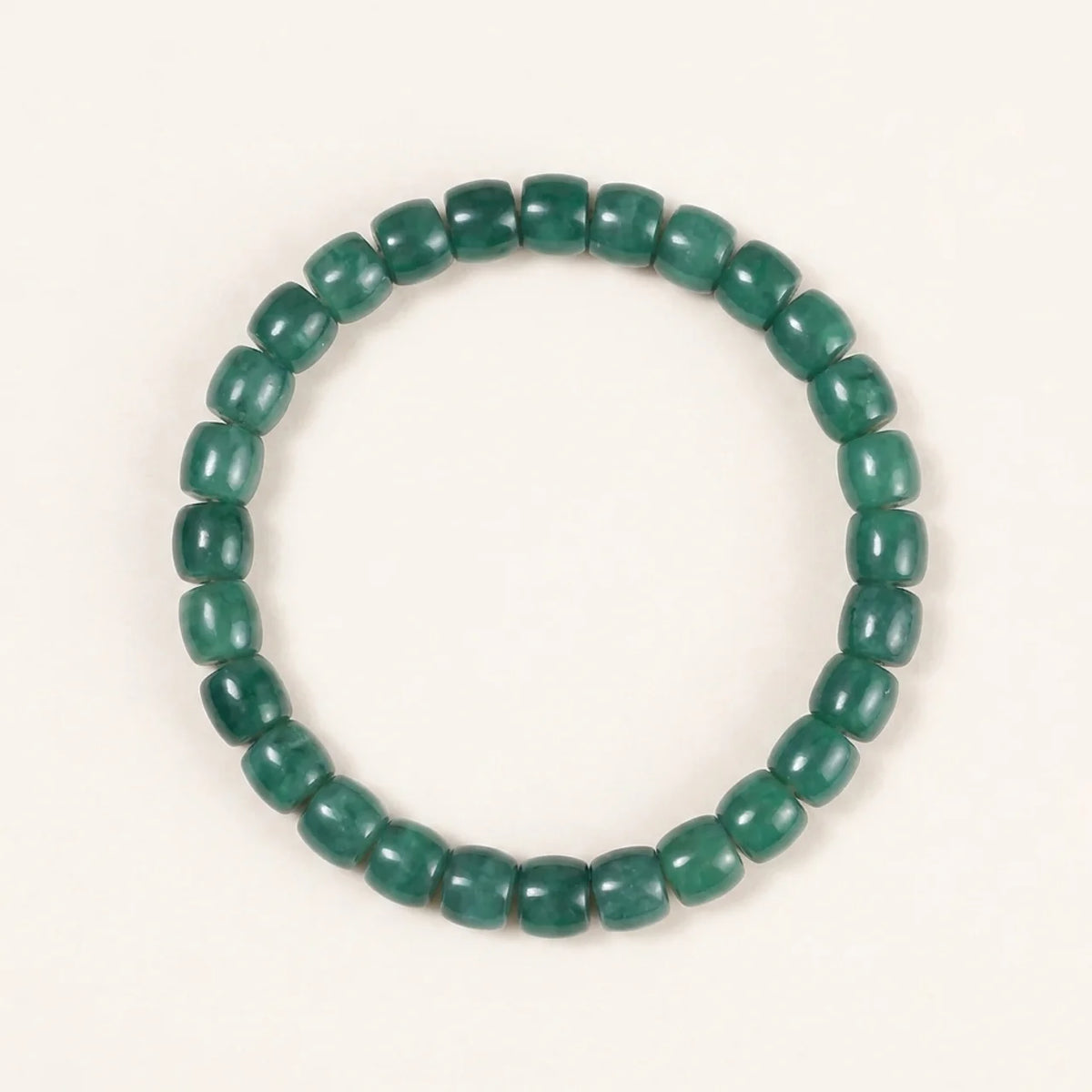 Bracelet en perles tonneau de jade bleu du Guatemala
