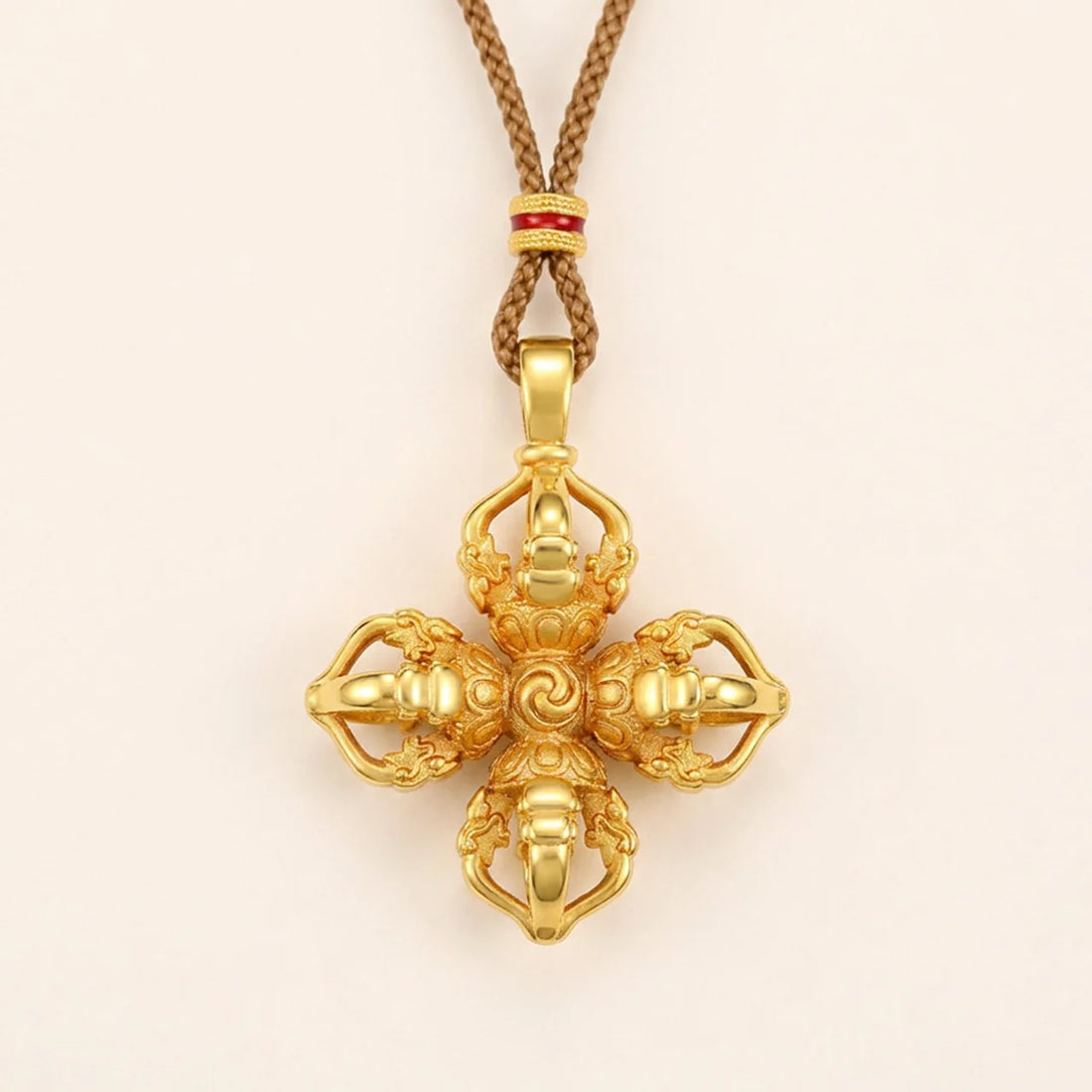 Halsband med korsad Vajra Dorje i guldfärgad finish