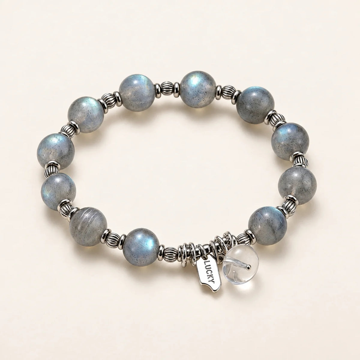 Bracelet en perles de pierre de lune grise avec breloque quartz