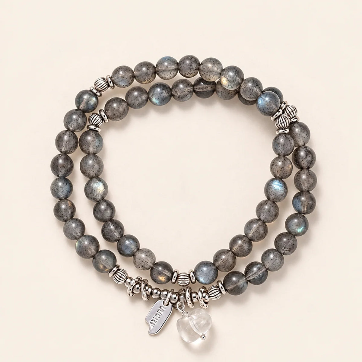 Bracelet en perles de pierre de lune grise avec breloque quartz