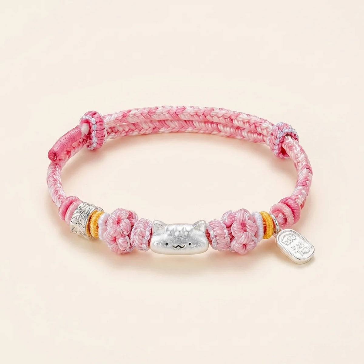 Bracelet à cordon pastel tressé avec chat porte-bonheur
