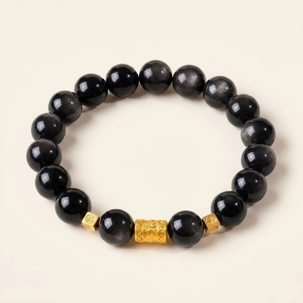 Bracelet en perles d’œil-de-chat rose avec breloque
