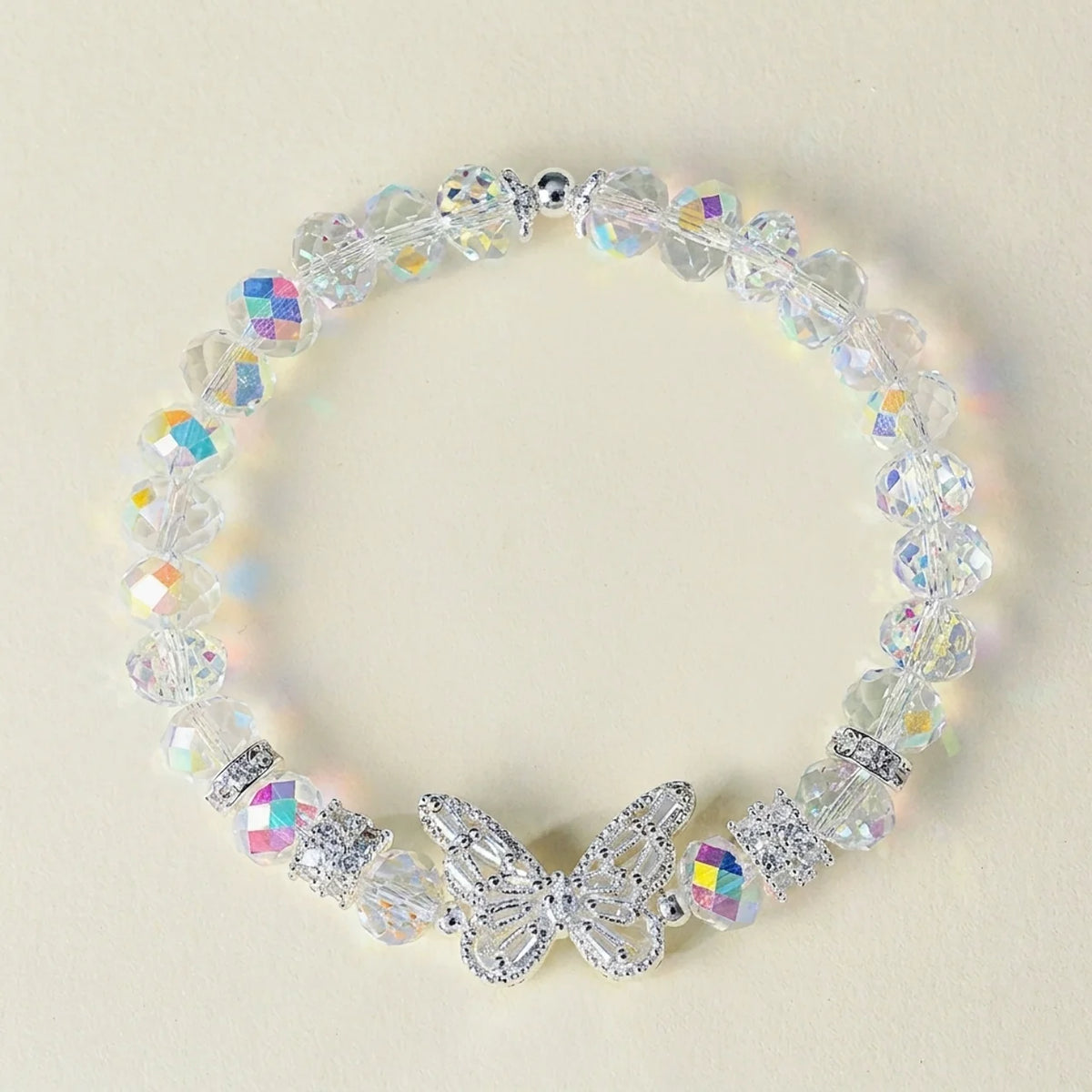 Bracelet en cristal rose avec breloque papillon