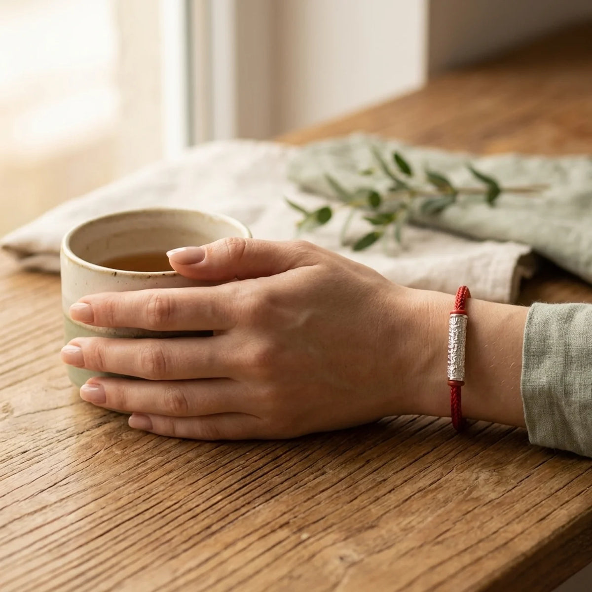 Bracelet protecteur Tai Sui sur cordon rouge