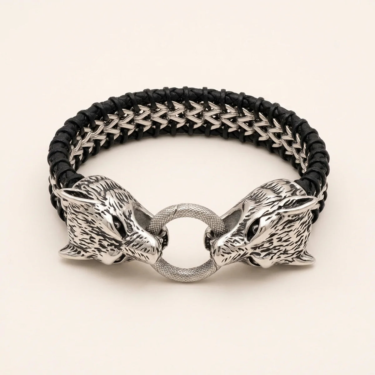 Bracelet en cuir tressé avec têtes de lion en acier